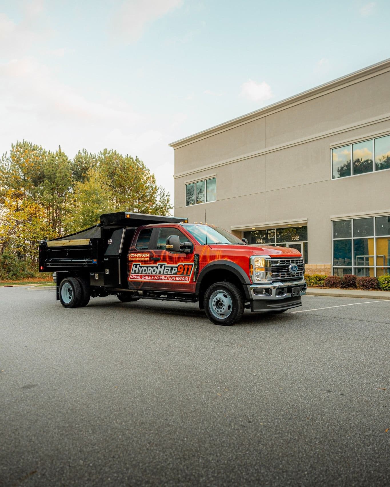 HydroHelp911 Dumptruck — Custom Design Printed Commercial Wrap by Testament Graphic House