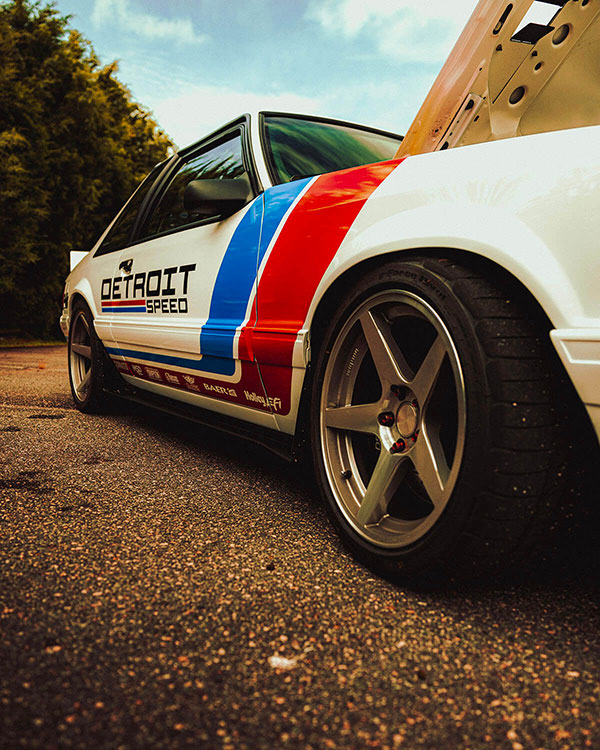 Custom Vinyl Graphics on a white mustang