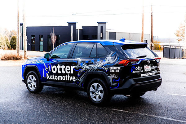 A custom designed commercial wrap on a toyota rav4